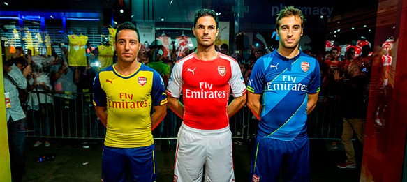 Mikel Arteta, Santi Cazorla and Mathieu Flamini present the new Arsenal kits
