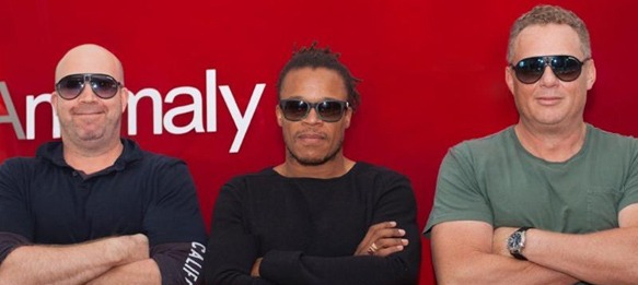 Anomaly founding partners Mike Byrne and Richard Mulder with Edgar Davids