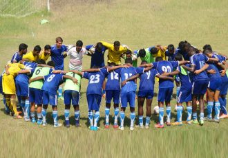 Mohammedan Sporting Club players and officials during a huddle.