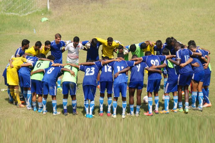 Mohammedan Sporting Club players and officials during a huddle.