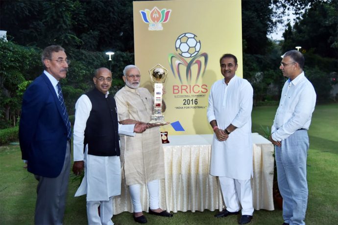 Prime Minister Narendra Modi unveils BRICS U-17 Football Tournament trophy