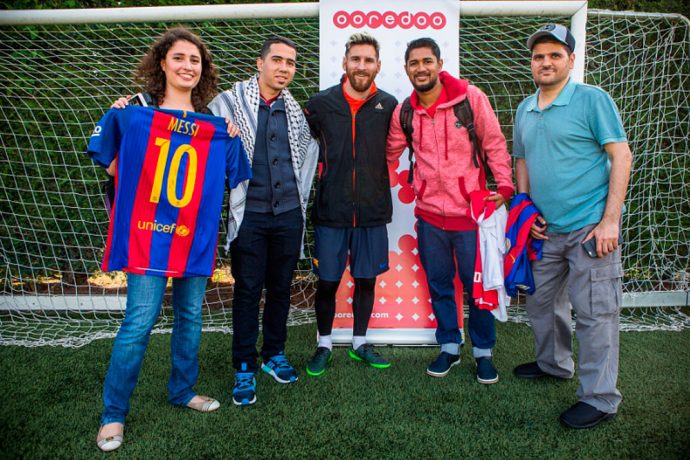 Leo Messi meeting Ooredoo's Stand For Good Winners (PRNewsFoto/Ooredoo)