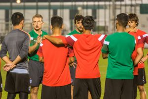 Bengaluru FC Head Coach Albert Roca speaks to his players in training at a facility in Doha (Photo courtesy: Bengaluru FC)