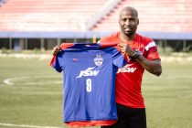 Bengaluru FC striker Cornell Glen poses for pictures with the club jersey following his loan move from Ozone FC Bengaluru (Photo courtesy: Bengaluru FC)