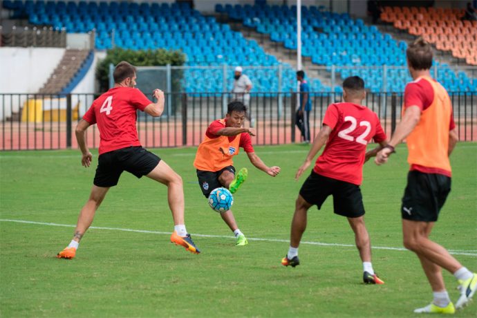 Udanta Singh (Orange) tries to curl one in at the far post during a training session ahead of Bengaluru FC's Inter-Zonal semifinal against 4.25 SC at the Kanteerava Stadium, in Bengaluru, on August 22nd. (Photo courtesy: Bengaluru FC)