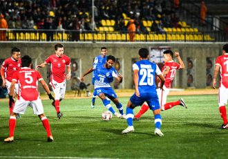 Bengaluru FC midfielder Alwyn George tries to make his way through the Transport United defense in an AFC Cup Preliminary Stage clash at the Changlimithang Stadium, in Thimphu. (Photo courtesy: Bengaluru FC)