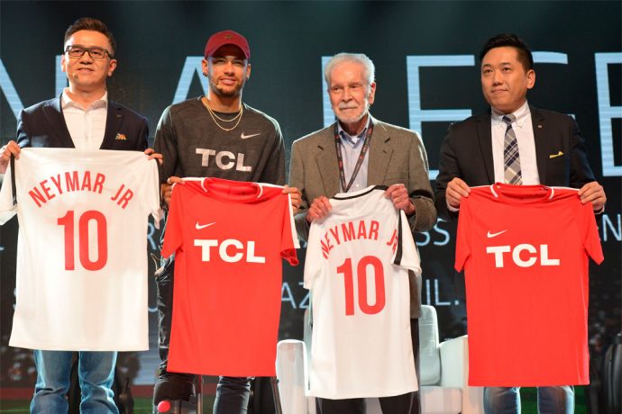 Neymar Jr. was officially welcomed as Global Brand Ambassador of TCL and presented with a Chinese stamp by Sean Zhang, General Manager of Brand Management Center. In exchange, his autographed football shirt was presented to Kevin Wang, Senior Vice President of TCL Corporation and CEO of TCL Multimedia, Sean Zhang, General Manager of Brand Management Center of TCL Corporation and Dr. Affonso Brandao Hennel, joint venture partner of TCL in Brazil. (TCL Multimedia)