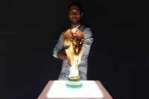 Chris Punnakkattu Daniel with the FIFA World Cup trophy. (© CPD Football)