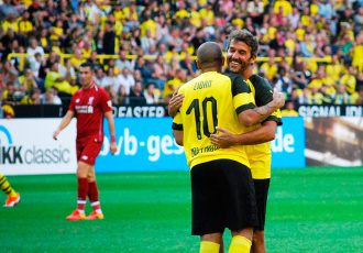 Egyptian star Mohamed Zidan and 1990 FIFA World Cup winner Karl-Heinz Riedle celebrating during the Borussia Dortmund vs Liverpool FC Legends Match at the BVB Season Opening on August 11, 2018. (© CPD Football)
