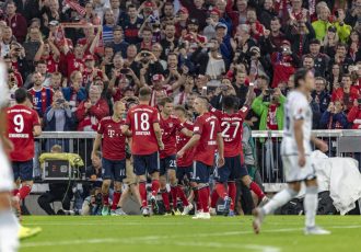 FC Bayern Munich players celebrating at the Allianz Arena in Munich, Germany. (Photo courtesy: Siemens / The Economist Group)