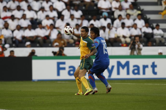 Gouramangi Moirangthem Singh with Australia legend Tim Cahill in India's first group stage match at the AFC Asian Cup Qatar 2011. (Photo courtesy: AIFF Media)