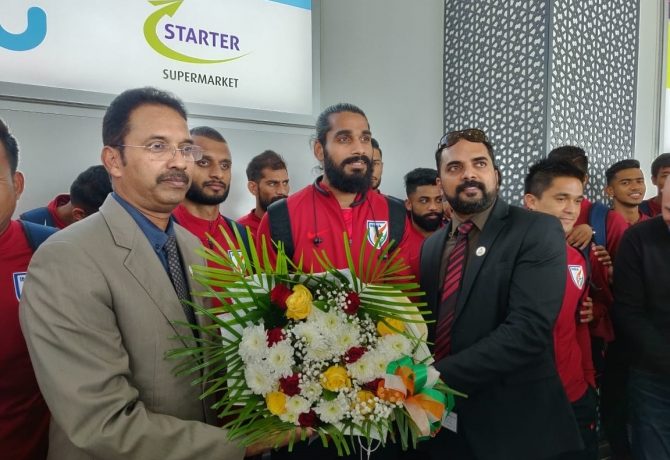 Officers from the Indian Embassy welcome the Indian national team on their arrival at the Abu Dhabi international airport. (Photo courtesy: AIFF Media)