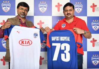 Dr. Naveen Thomas, CEO & Director of Baptist Hospital, and Bengaluru FC CEO Mandar Tamhane at the signing of the MoU at the Bengaluru Football Stadium. (Photo courtesy: Bengaluru FC)