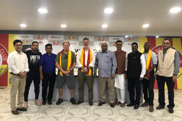 East Bengal and Manchester United officials at the sidelines of a meeting in Kolkata.