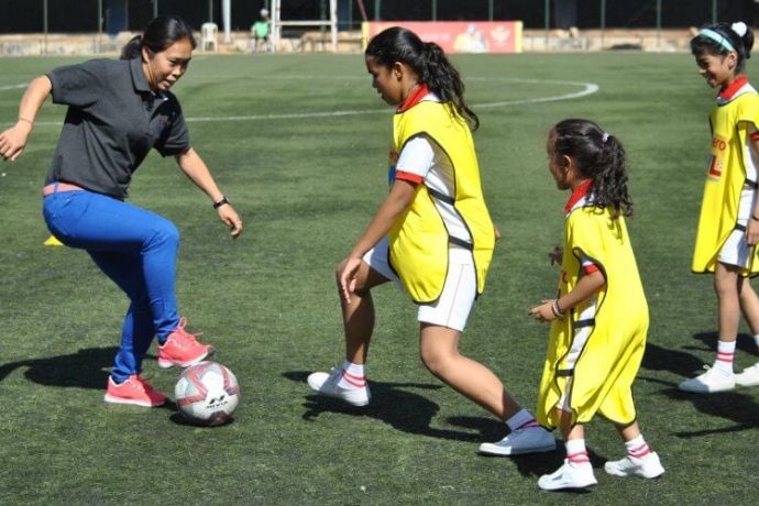 Indian Women's football legend Oinam Bembem Devi playing football with girls. (Photo courtesy: AIFF Media)