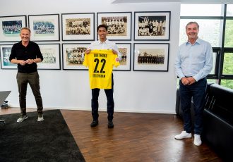 Borussia Dortmund's Chairman of the Board Hans-Joachim Watzke, midfielder Jude Bellingham and Sporting Director Michael Zorc. (Photo © Borussia Dortmund)