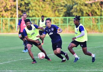 Bengaluru FC skipper Sunil Chhetri (centre) vies for possession with Rahil Bheke (L) and Leon Augustine in training at the Dempo SC Training Facility, in Goa, on Saturday, November 21. (Photo courtesy: Bengaluru FC)