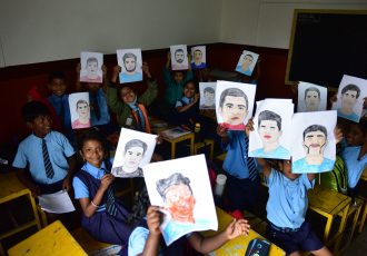 Children from the Shri Guru Harkrishan School in Ulsoor, draw the Bengaluru FC players for the club's Indian Super League squad announcement, on the occasion of Children's Day. (Photo courtesy: Bengaluru FC)