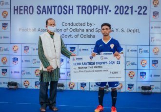 Odisha State Team player Chandra Muduli and Football Association of Odisha Vice President Bijay Das at the Hero Santosh Trophy post-match ceremony. (Photo courtesy: Football Association of Odisha)
